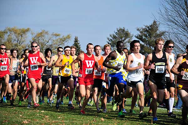 Shane Hoerbert (#634), Billy McManus (#636), and Dalton Boyer (#632) all finished in the top-25 at the regional championship meet to help Wabash qualify for this Saturday's NCAA Cross Country Nationals. Photo by Kent Graham Images.